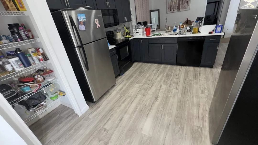 After flooring transformation: Modern gray wood-look flooring