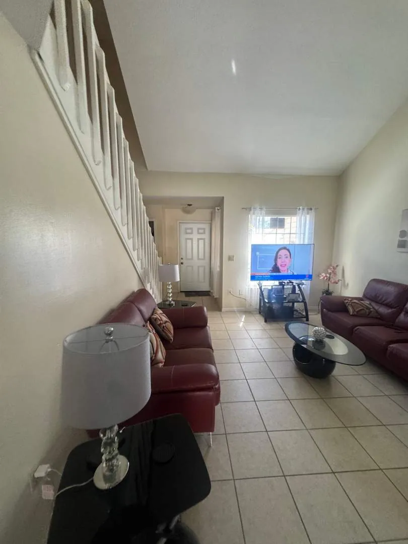 Before flooring transformation: Dated beige tile