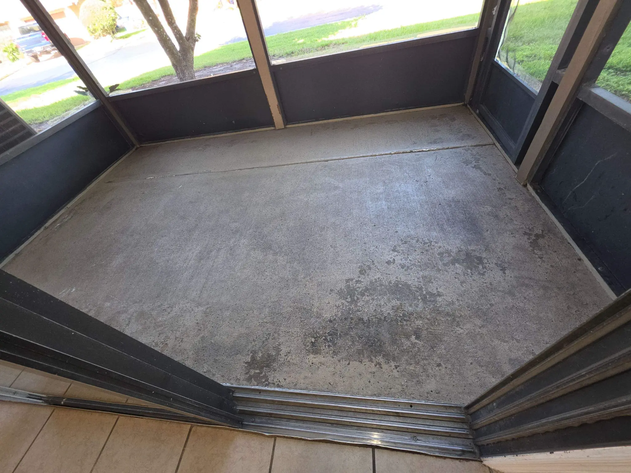 Before flooring transformation: Bare concrete surface