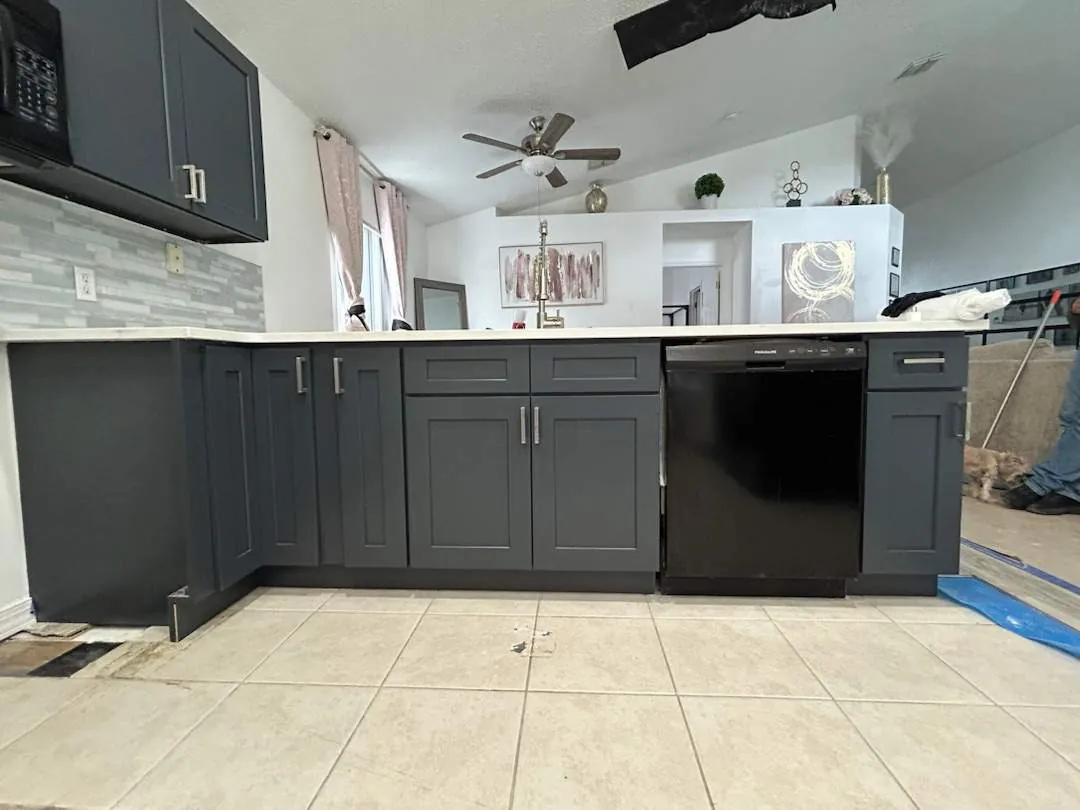 Before flooring transformation: Outdated square tile